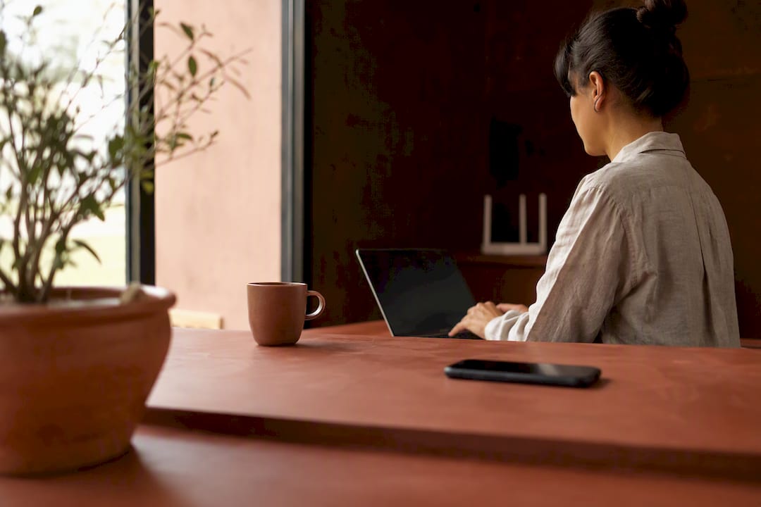Close-up of bilingual front desk setup