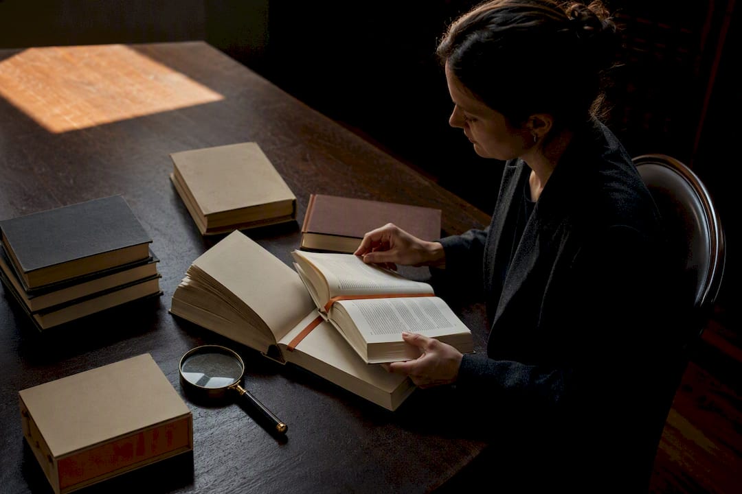 Legal reference books arranged for source comparison