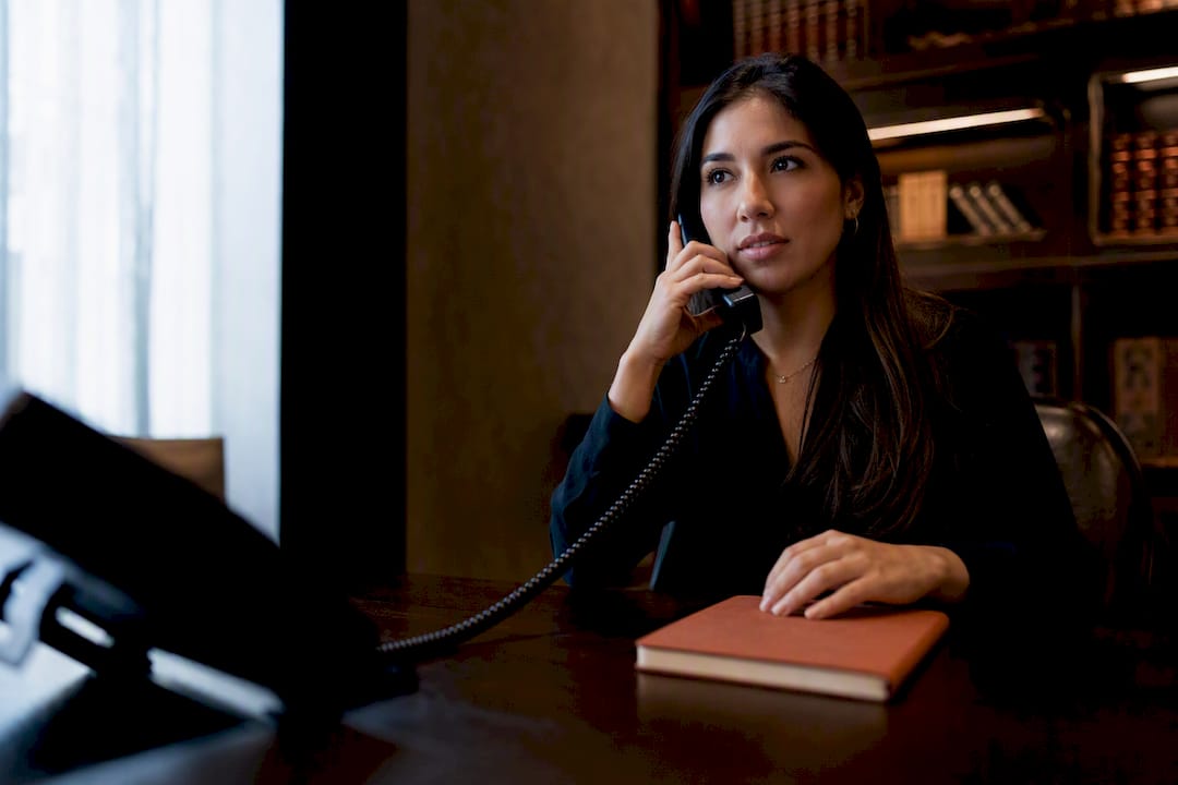 Coordinator handling bilingual legal intake call