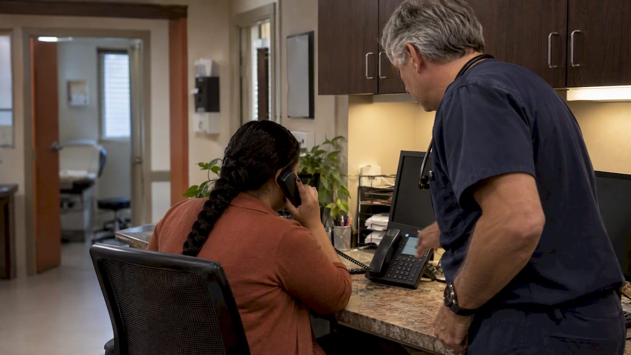 Clinic staff escalating an urgent patient call